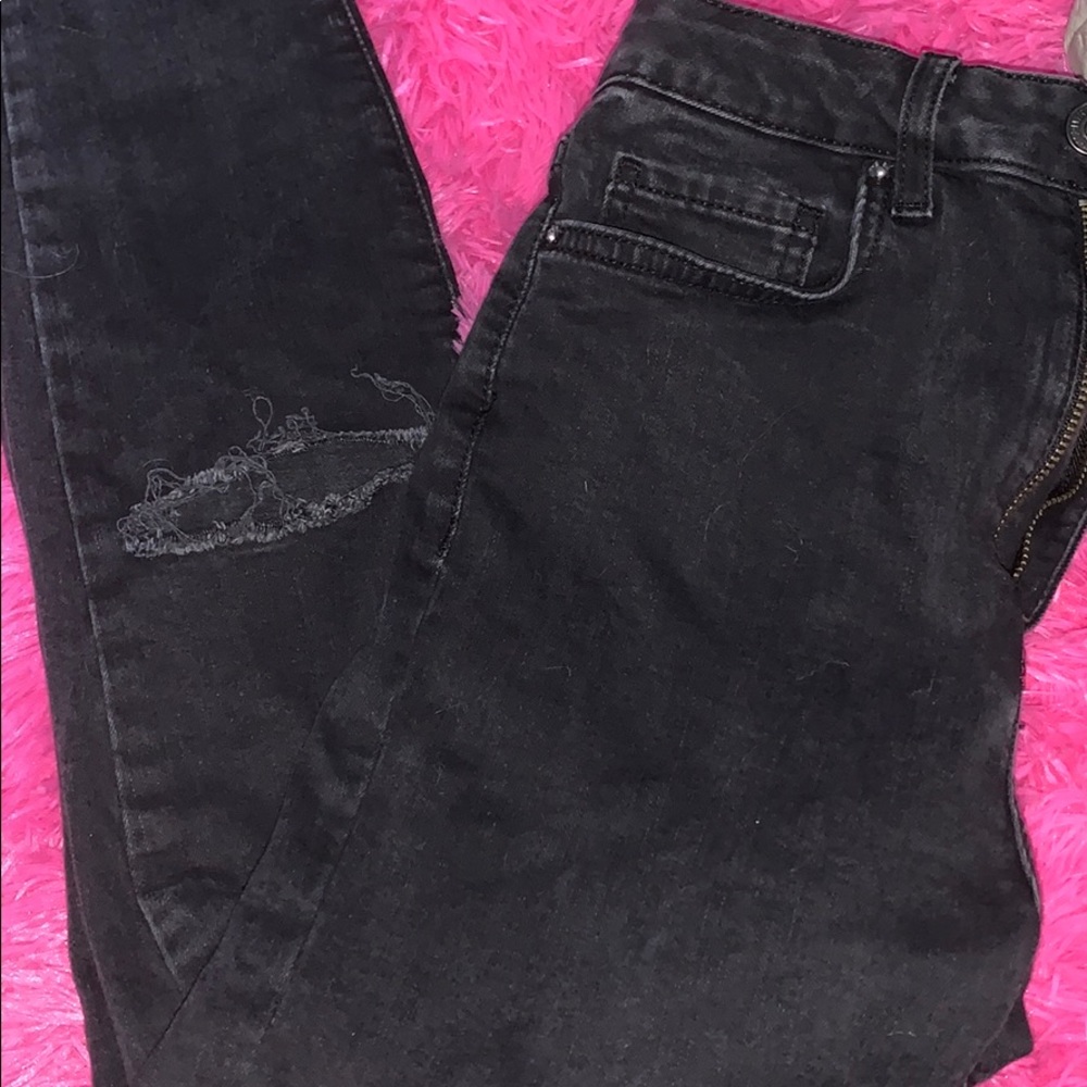 distressed black jeans